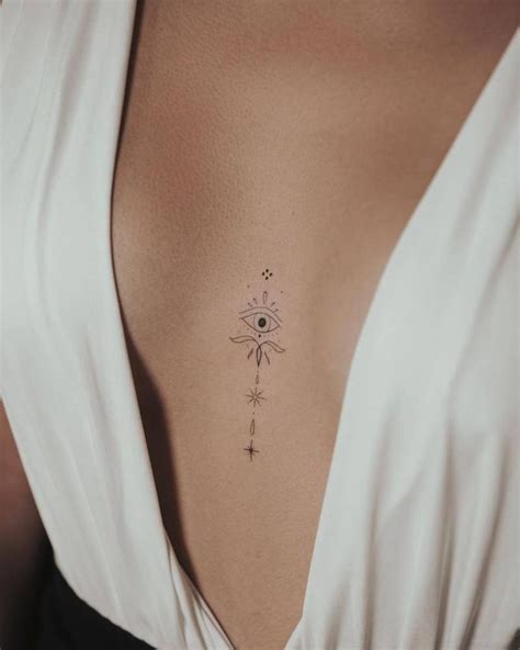 small tattoos between breast|30 Best Tattoo Between Breast Ideas You Should。